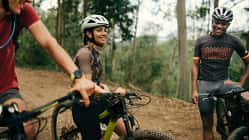 Group of friends cycling together in the nature