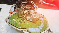 Electric bicycle motor repair. Open the engine during service at an e-bike service center.