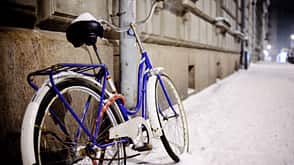 Bicycle leaning on wall