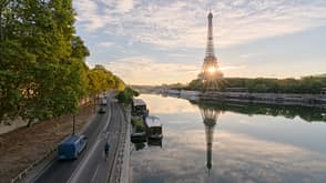 Reflection view of Eiffel tower and river Seine in morning light