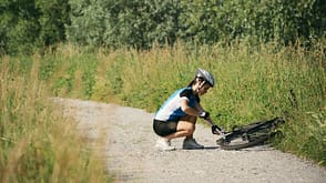 20s,Accident,Action,Activity,Adult,Bicycle,Bicycle Pump,Caucasian,Clothing,Cycle,Cycling,Cyclist,Deflated,Dirt Road,Female,Field,Flat,Flat Tire,Grass,Green,Inflating,Italy,Leisure Activity,Mountain,Mountain Bike,Nature,Non-Urban Scene,One Person,Outdoors,Park,People,Problems,Railroad Track,Repairing,Road,Rural Scene,Single Lane Road,Sport,Sports Clothing,Sports Helmet,Tire,Women young woman training on mountain bike and cycling in park