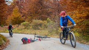 Mountain biker crashing in forest Mountain biker crashing in forest