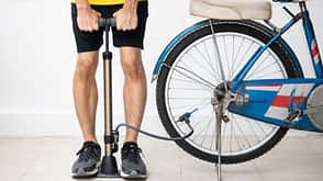 exercise,activity,air,air-pump,bicyclist,bike,biking,cycle,cyclist,fit,fitness,fixing,health,healthy,inflate,inflator,maintenance,man,manual,manually,pressure,pump,puncture,repair,ride,rider,serviceman,tire,tool,training,trouble,tyre,vehicle,workout Man inflates the bicycle tire.