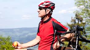 Racing Bicycle,Leisure Activity,Men,Hobbies,Senior Adult,Resting,Exercising,One Person,Action,Determination,Sport,Nature,Outdoors,Cycling,Recreational Pursuit,Activity,People,Summer,Springtime,European Alps,Sunglasses,Work Helmet,Bicycle Mature man with racing bicycle, Freiburg, Germany