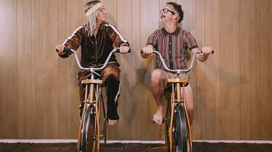 Retro Nineteen Eighties Aesthetic Exercise Bike Couple