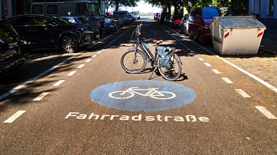 Bicycle road where the traffic with the bicycle has priority over the car, bicycle tour Berlin