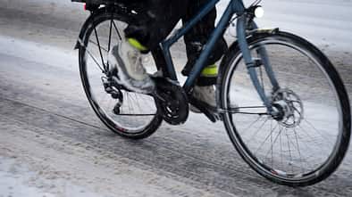 Bicycle driving on snowed street