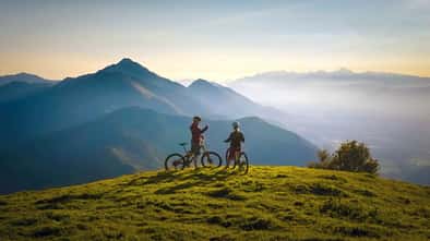 Two females on mountain bikes