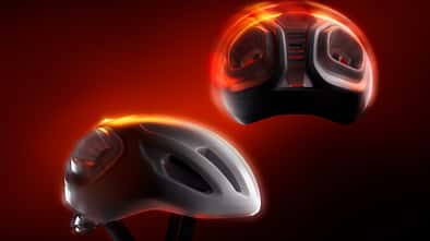 Rennradhelm,Gravelhelm,Poc Admidal,zwei Helme,roter Hintergrund