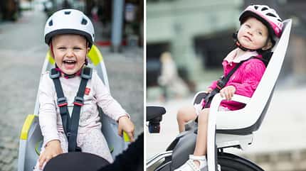 Kindertransport Fahrrad I Kindersitz I Zwei Kleinkinder im Kindersitz Kindertransport Fahrrad I Kindersitz I Zwei Kleinkinder im Kindersitz