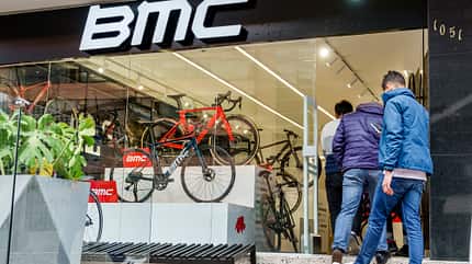 el chico,carrera 11,bmc bicycle,bicycle store,bike,boy,male,friends,outside,front entrance,hispanic ethnicity Bogota, Colombia, El Chico, BMC bicycle shop, group of teens entering store