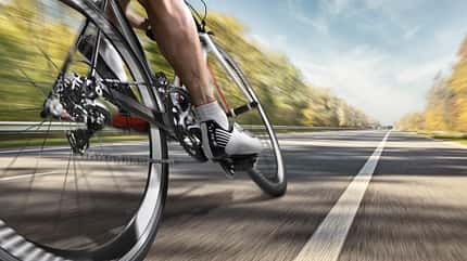 Racing Bicycle,Sports Helmet,Physical Activity,Men,Cycle,Sports Clothing,Relaxation Exercise,Hobbies,Cycling Shorts,Adult,Looking,Sprinting,Caucasian Ethnicity,One Person,Wheel,Tire,Strength,Action,Endurance,Effort,Determination,Exploration,Speed,Sport,Lifestyles,Back Lit,Outdoors,Blurred Motion,Horizontal,Cheerful,Professional Sport,Competitive Sport,Triathlon,Cycling,Activity,Human Muscle,People,Autumn,Mountain Range,Mountain,Hill,Equipment,Work Helmet,Clothing,Bicycle,Isolated On White,Bicycle Pedal,Sport Race Professional road cyclist