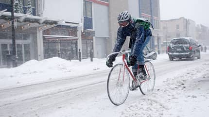 Bicycle Courier in Montreal during a blizzard