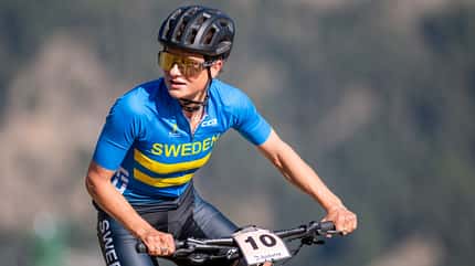 extreme,sportsman,competitor,bike,background,outdoor,cycle,masters,cyclist,sports,healthy,couple,xco,uci,massana,woman,trail,man,cross country,la,team,professional,vallnord,biking,action,speeding,world,race,mtb Mountain Biker in Action