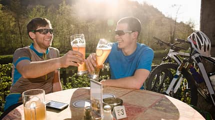 Young men drinking beer, Bavaria, Germany