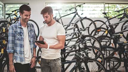Men in bicycle store