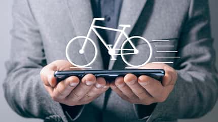 bicycle icon. man tapping on the screen