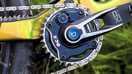 Detailaufnahme eines Mountainbike-Antriebs mit SRAM X0 Kurbel und Ochain-Kettenblatt, aufgenommen beim RockShox Sram Presscamp 2026 in Queenstown, Neuseeland.