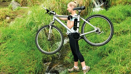 UB-Bimoz-Motor-girl-carrying-bike-with-bimoz (jpg)