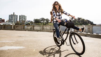 A female having fun on a bike