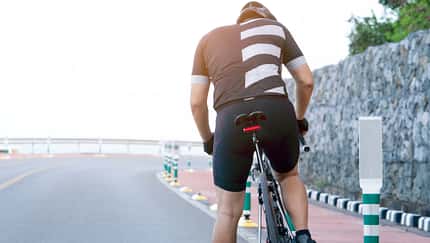 Asian men are cycling road bike in the morning