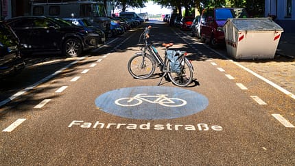 Bicycle road where the traffic with the bicycle has priority over the car, bicycle tour Berlin