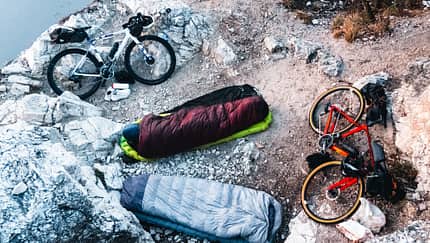 Camping with bicycles on bluff above lake Camping with bicycles on bluff above lake