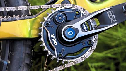 Detailaufnahme eines Mountainbike-Antriebs mit SRAM X0 Kurbel und Ochain-Kettenblatt, aufgenommen beim RockShox Sram Presscamp 2026 in Queenstown, Neuseeland.