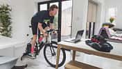 Man cycling on turbo trainer