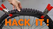 Bike-Hack für leichteres Reifenaufziehen mit Klammern aus dem Baumarkt.