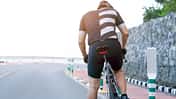 Asian men are cycling road bike in the morning