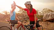 Bikeriders & training partners doing high-five