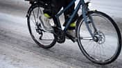 Bicycle driving on snowed street