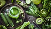 Detox diet concept: green vegetables on rustic table