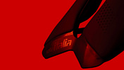 Selle Italia SLR,Rennradsattel,roter Hintergrund,Sattelende