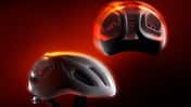 Rennradhelm,Gravelhelm,Poc Admidal,zwei Helme,roter Hintergrund